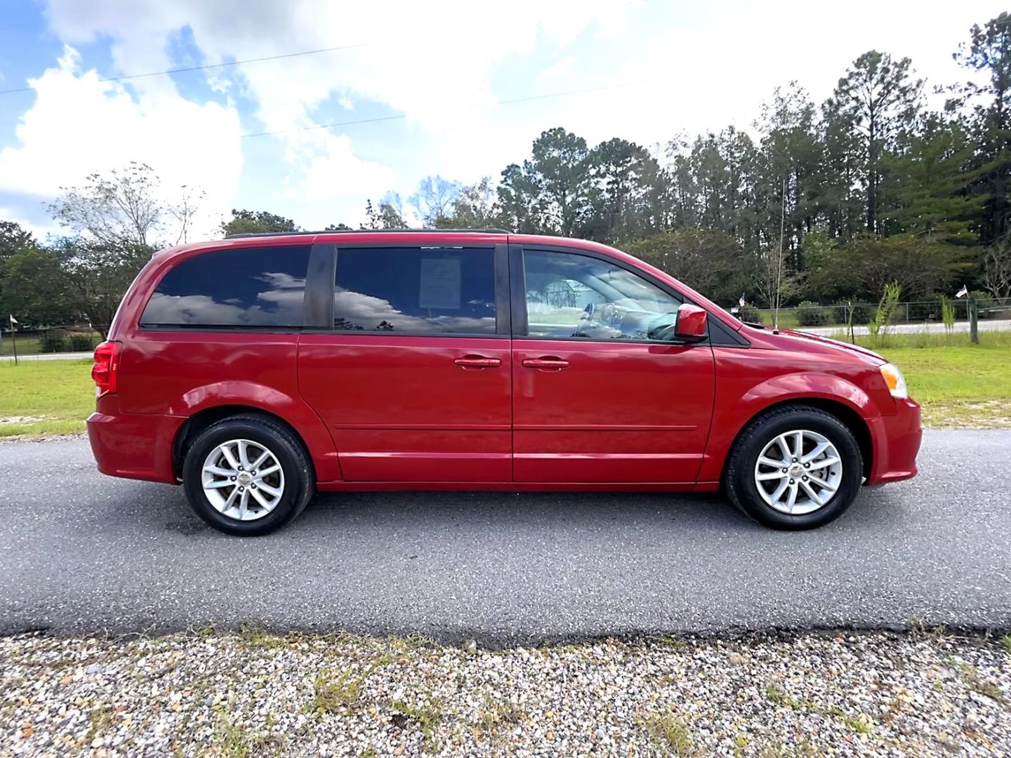 2016 Red Dodge Grand Caravan SXT (2C4RDGCG4GR) with an 3.6L V6 DOHC 24V engine, 6Automatic transmission, located at 18001 Kellogg Rd, Saucier, MS, 39574, (228) 832-1441, 39.421459, -76.641457 - Photo#1